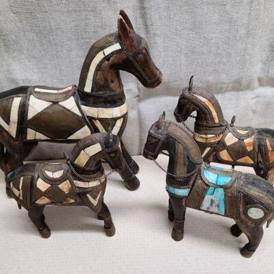 Set of 4 vintage, hand carved folk art horses