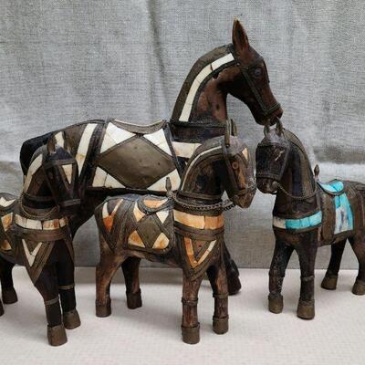 Set of 4 vintage, hand carved folk art horses