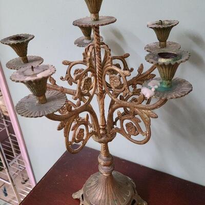 Pair of ornate 6 arm metal candelabras 