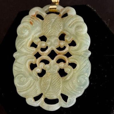 Carved Jade Pendant with Auspicious Bat Pattern