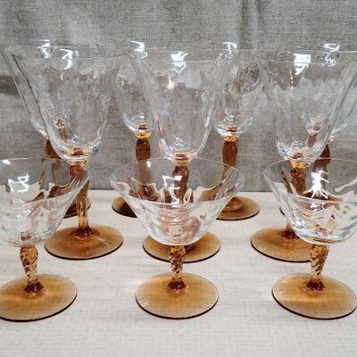 10 Fostoria glasses with amber swirled stems