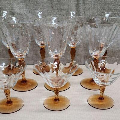 10 Fostoria glasses with amber swirled stems