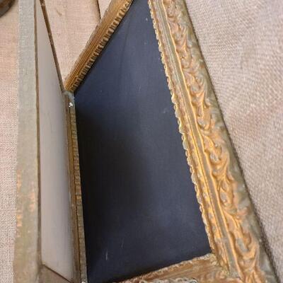 Vintage wall art with secret compartment