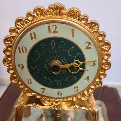 Vintage United clock company with dancers