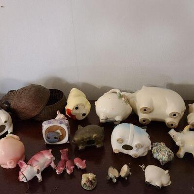 Large 20 piece assorted lot of pig collectables and piggy banks. 