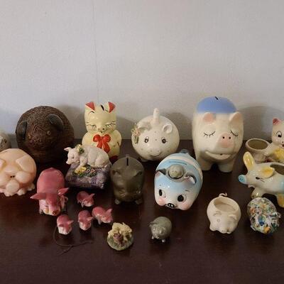 Large 20 piece assorted lot of pig collectables and piggy banks. 