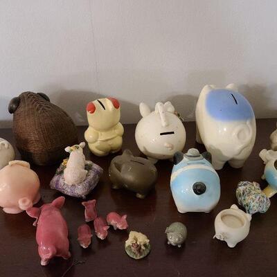 Large 20 piece assorted lot of pig collectables and piggy banks. 