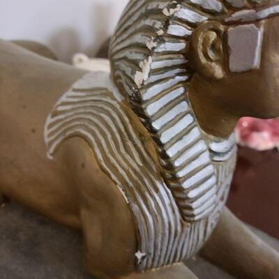 Ceramic sphinx statue
