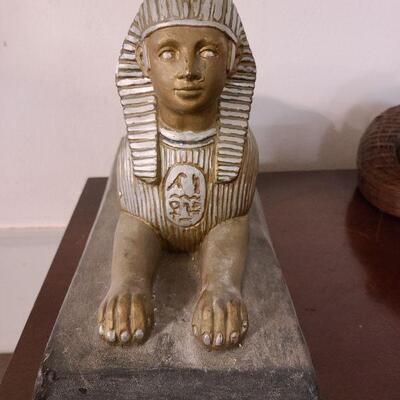 Ceramic sphinx statue