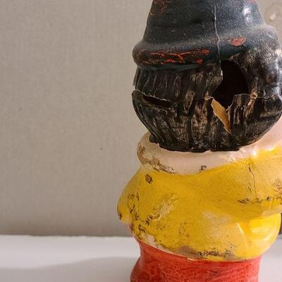 13 pc. Vintage clown collection with white wicker shelf.