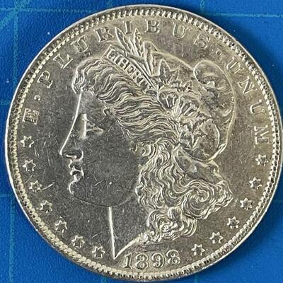#198  MORGAN Silver Dollar, Circulated 1898 no Mint mark. 