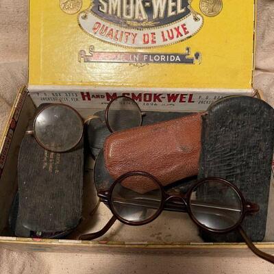 Cigar box of antique children's glasses 