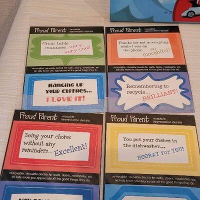 Lot 28: (2) New Children's Books and Proud Parent Labels