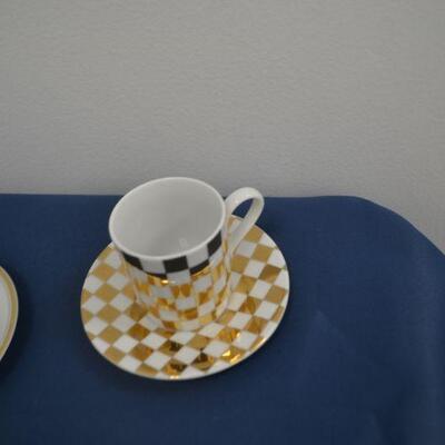 LOT 37 CUPS, SAUCERS AND CREAMER