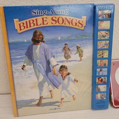 Lot 89: Religious Book NEW and GOD LOVES YOU License Plate Accent