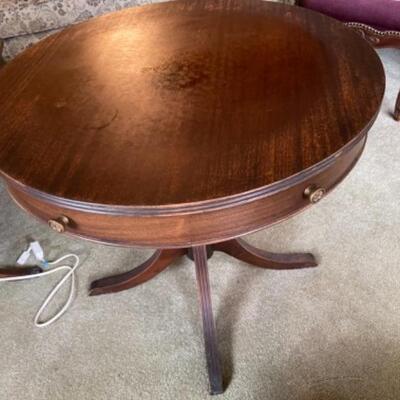 Lot 3L. Mahogany lamp table with drawer (27.5 inches in diameter)--$45