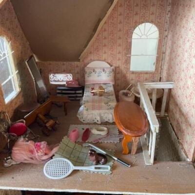 Lot 15L. Two circa 1960 doll houses, Victorian and millinery shop, with furniture--$120