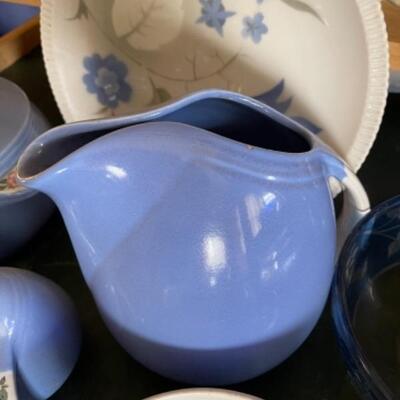 Lot 17L. Collection of blue glassware, 5 bud vases, Hall blue ceramics, blue plate, etc.--$95
