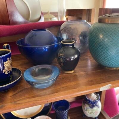 Lot 18L. Blue Limoges, blue ceramics, cobalt blue glass, urns, candlestick wax protectors, etc.--$75