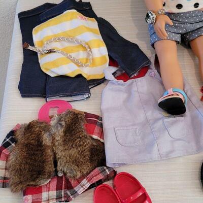 Lot 112: Journey Girl Doll, Carrying Case, Clothes & Shoes 