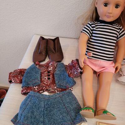 Lot 114: Journey Girl Doll with Carrying Case, an Outfit, Umbrella and lots of Shoes