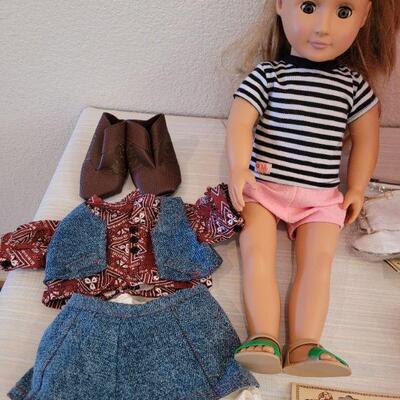 Lot 114: Journey Girl Doll with Carrying Case, an Outfit, Umbrella and lots of Shoes