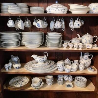 Lot 22DR. Large collection of Royal Copenhagen blue and white dishes (some as is) and several serving piecesâ€”coffee pot, tea pots,...