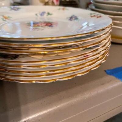 Lot 23DR. Huge lot of assorted cups and saucers along with teapot, creamers and sugars, dessert plates, extra saucers--$95