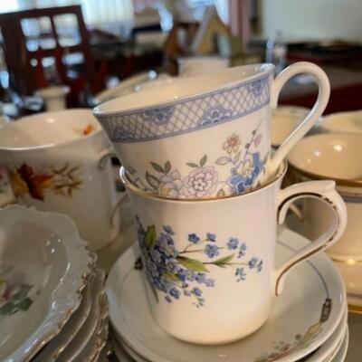 Lot 23DR. Huge lot of assorted cups and saucers along with teapot, creamers and sugars, dessert plates, extra saucers--$95