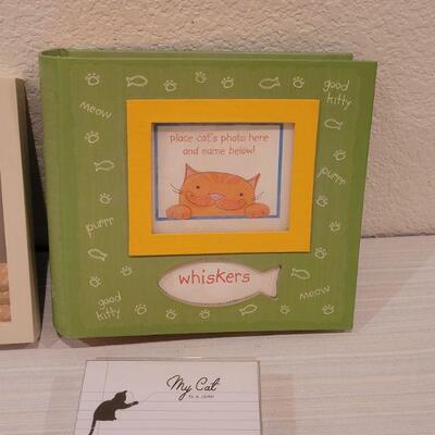 Lot 182: New Frame, Memo Pads, Album and Tags