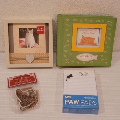 Lot 182: New Frame, Memo Pads, Album and Tags