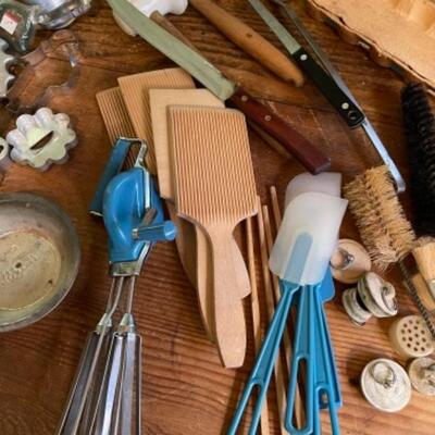 Lot 73K. Rolling pin, molds, ladles, can opener, hand mixer, cookie cutters, etc.--$85