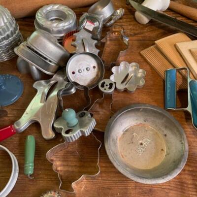 Lot 73K. Rolling pin, molds, ladles, can opener, hand mixer, cookie cutters, etc.--$85