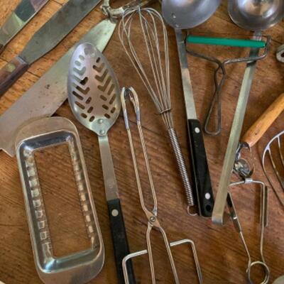Lot 74K. Vintage cooking utensilsâ€”ladles, graters, shears, butter slicer, cheese slicer, etc.--$65