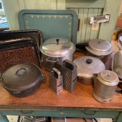 Lot 75K. Assortment of pots, pans, trays, pressure cooker, Dutch oven (Wagner Ware)--$85