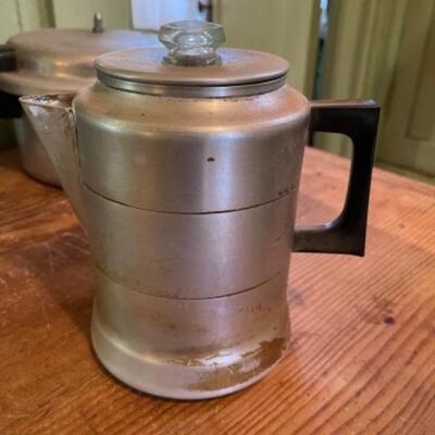 Lot 75K. Assortment of pots, pans, trays, pressure cooker, Dutch oven (Wagner Ware)--$85