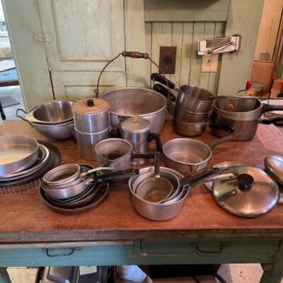 Lot 76K. Assorted pots and pans, small skillet, strainer, colander, pie pans, sifter, tart pan, cake pans, etc.--$50