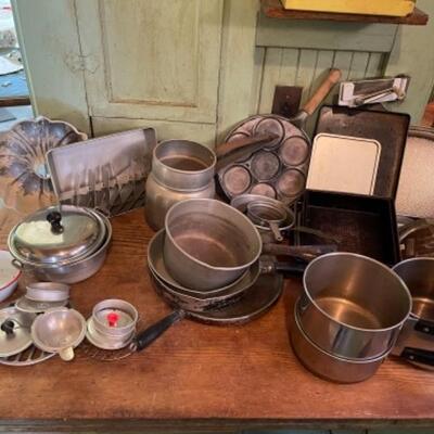 Lot 77K. Assortment of pots, pans and bakeware--$50