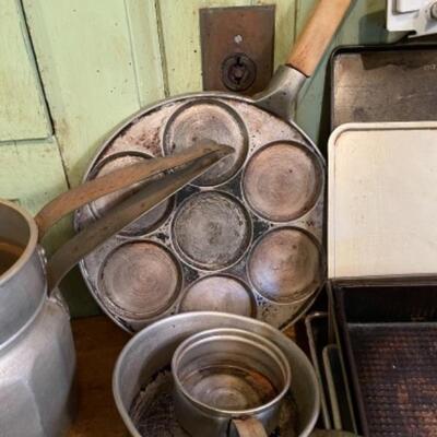 Lot 77K. Assortment of pots, pans and bakeware--$50