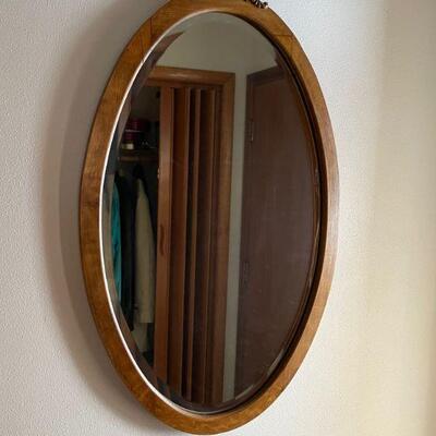 Antique oval wall mirror