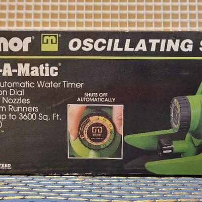Lot 212: Vintage MELNOR Time-a-Matic Sprinker Garden 