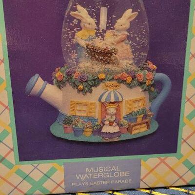 Lot 234: Vintage New Stock EASTER CELEBRATION Musical Waterglobe Plays EASTER PARADE