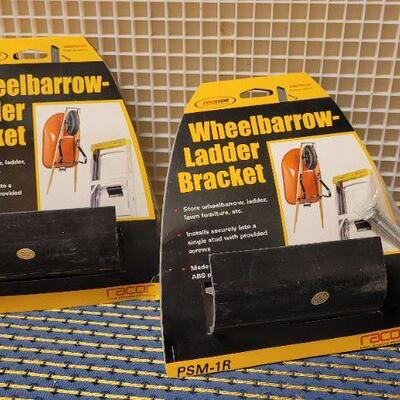 Lot 235: (2) New Garage Shop WHEELBARROW OR LADDER Hanging Bracket 