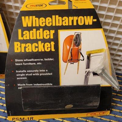 Lot 235: (2) New Garage Shop WHEELBARROW OR LADDER Hanging Bracket 