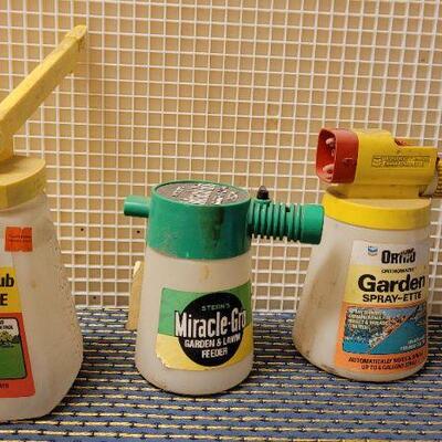 Lot 247: (3) Vintage Garden Fertilizer Spray Tools