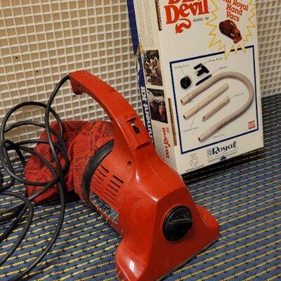 Lot 259: Dirt Devil Vacuum + Accessory Bundle