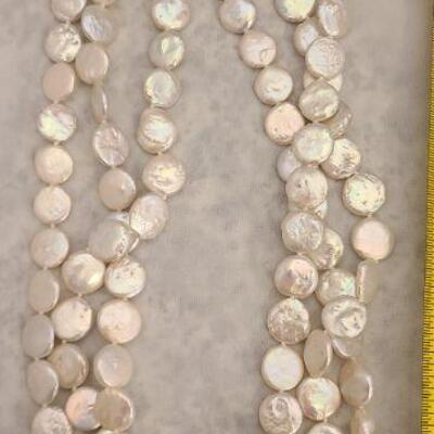 2- 3 strand flat pearl necklaces. 
