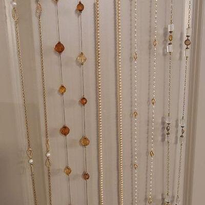 5 long strand necklaces with amber, pearl, and glass accents, 