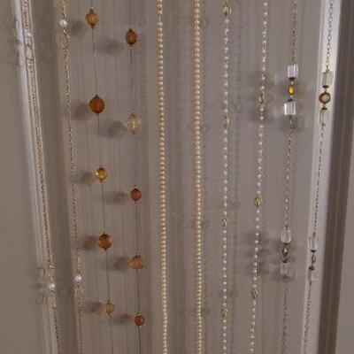 5 long strand necklaces with amber, pearl, and glass accents, 