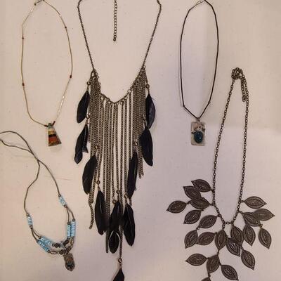 5 assorted costume necklaces. 